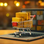 Online shopping e-commerce and customer experience concept: cashiers with shopping cart on a laptop keyboard, depict shopper consumers buy or purchase goods and services at home or office